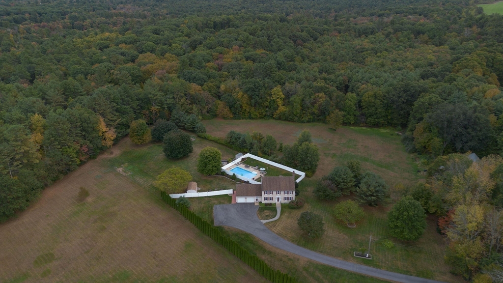 49 Dennis Whitney Road Oakham, MA 01068 - Photo 2 of 40 an aerial view of a house with lake view