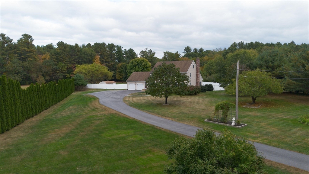 49 Dennis Whitney Road Oakham, MA 01068 - Photo 33 of 40 an aerial view of a house with a yard