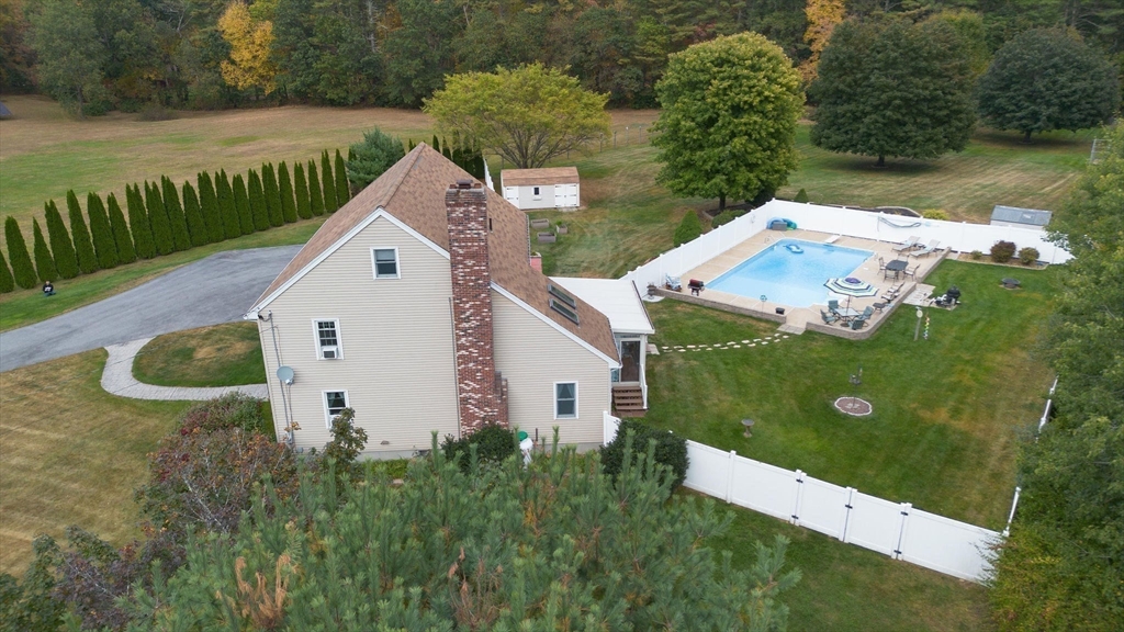 49 Dennis Whitney Road Oakham, MA 01068 - Photo 4 of 40 a view of a house with a yard
