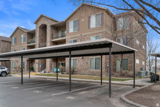 476 West 200 N Street, Unit 206 Springville, UT 84663 - Photo 20 of 24 View of property with stairway and covered parking