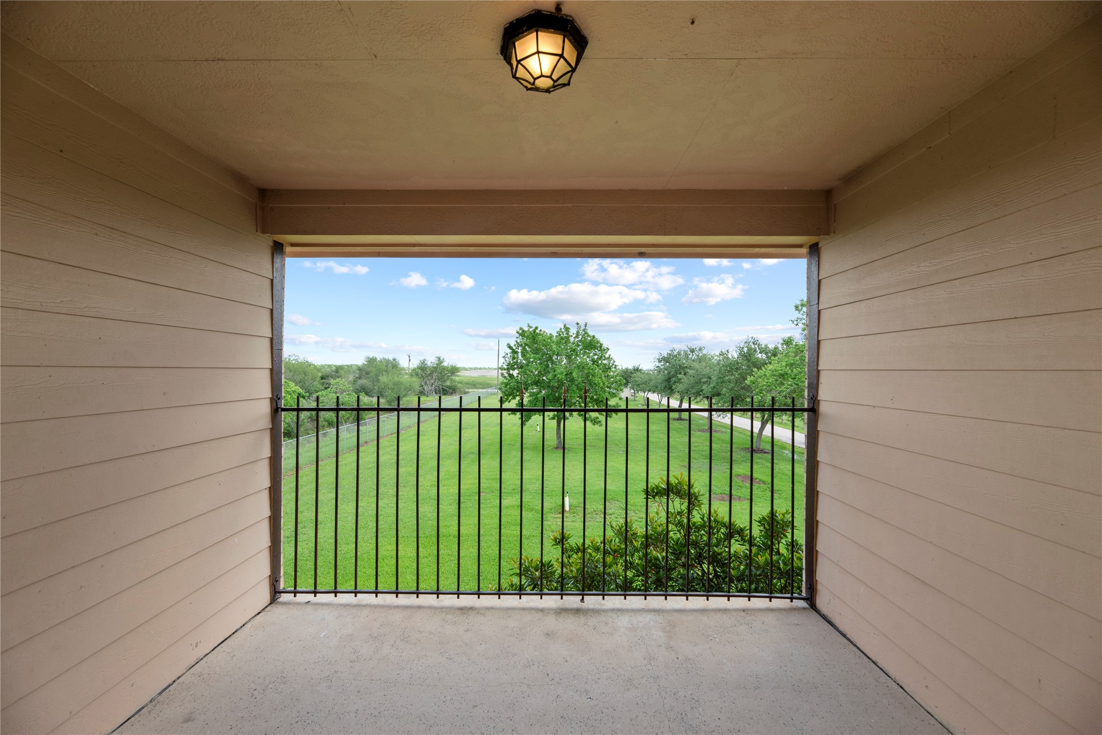 523 Moore Bar Road Rosenberg, TX 77471 - Photo 21 of 50 There is also a front porch and second floor balcony. This is the view from that front balcony.
