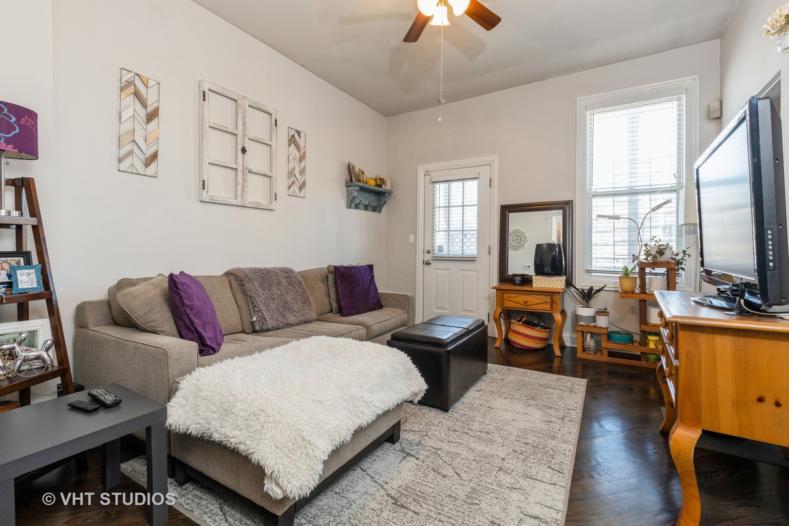 846 North Wolcott Avenue, Unit 2R Chicago, IL 60622 - Photo 3 of 12 a living room with furniture flat screen tv and window
