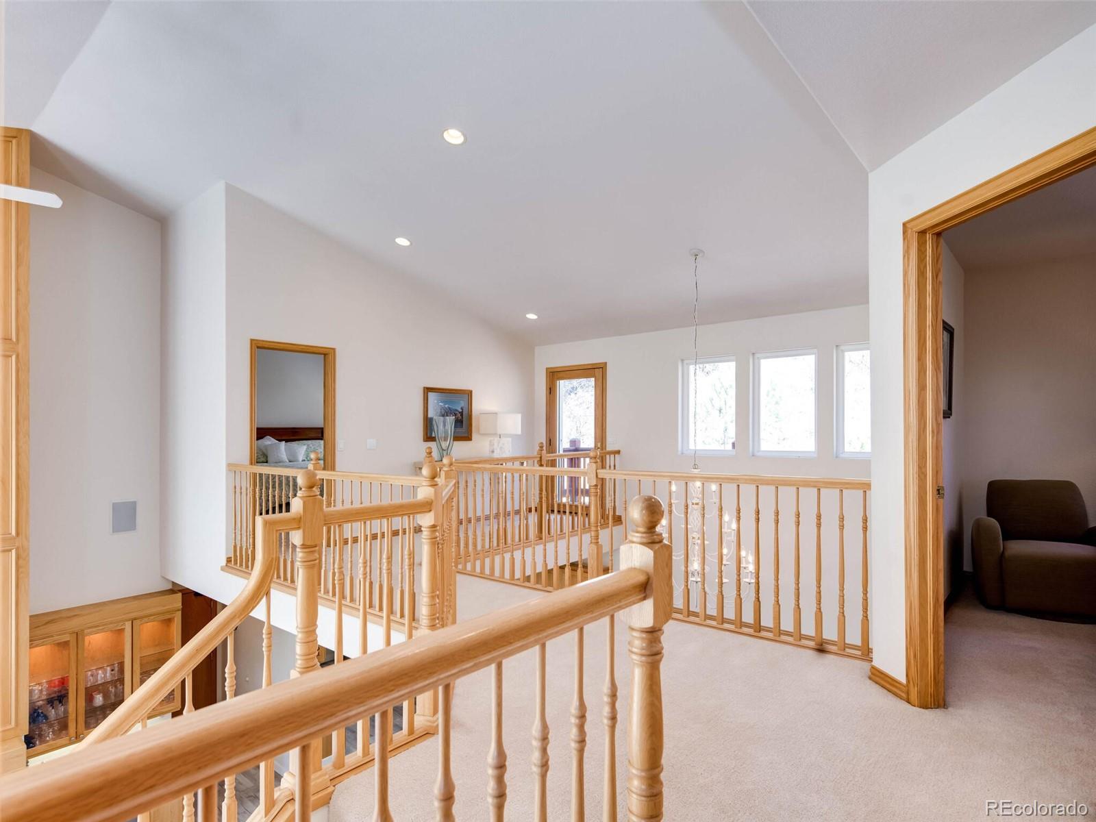 180 Nuthatch Road Evergreen, CO 80439 - Photo 30 of 40 a view of a room with furniture and windows