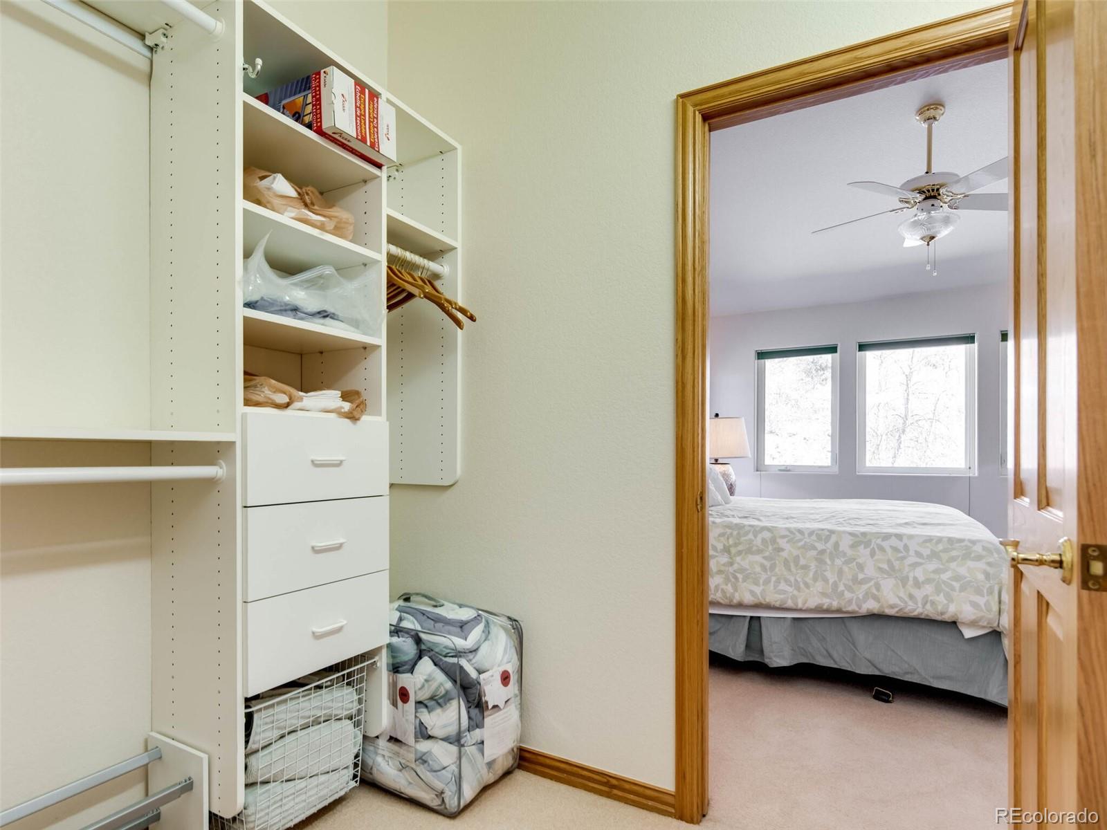 180 Nuthatch Road Evergreen, CO 80439 - Photo 40 of 40 a view of bedroom with bedroom and window