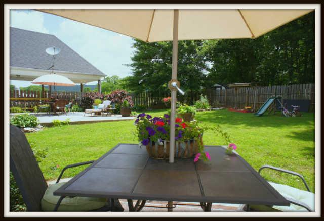 10352 Valley View Road Lascassas, TN 37085 - Photo 18 of 19 THE BACK YARD HAS TWO AREAS FOR ENTERTAINING.