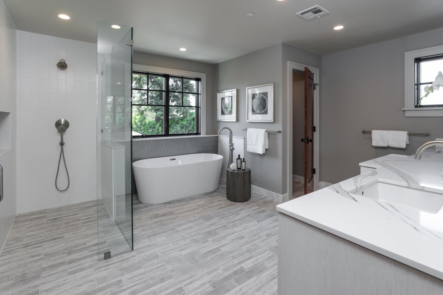 28 Bloomfield Road Burlingame, CA 94010 - Photo 14 of 27 a bathroom with a tub sink and mirror