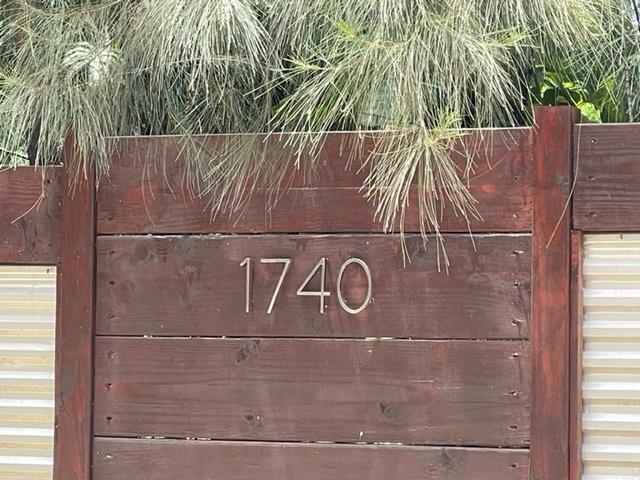 a view of outdoor space with wooden fence