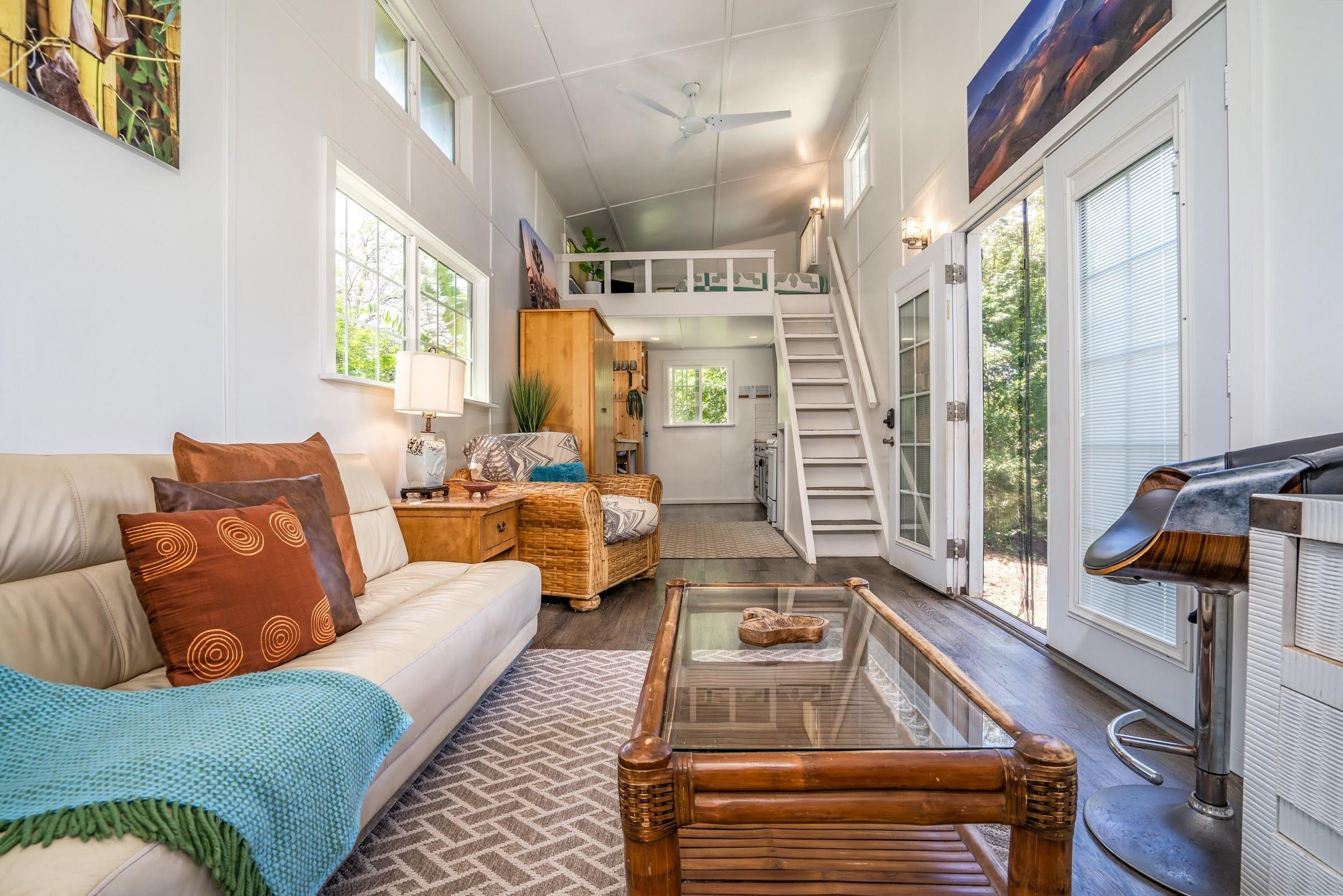 1740 Kokomo Road, Unit B Haiku, HI 96708 - Photo 19 of 29 a living room with furniture and a window