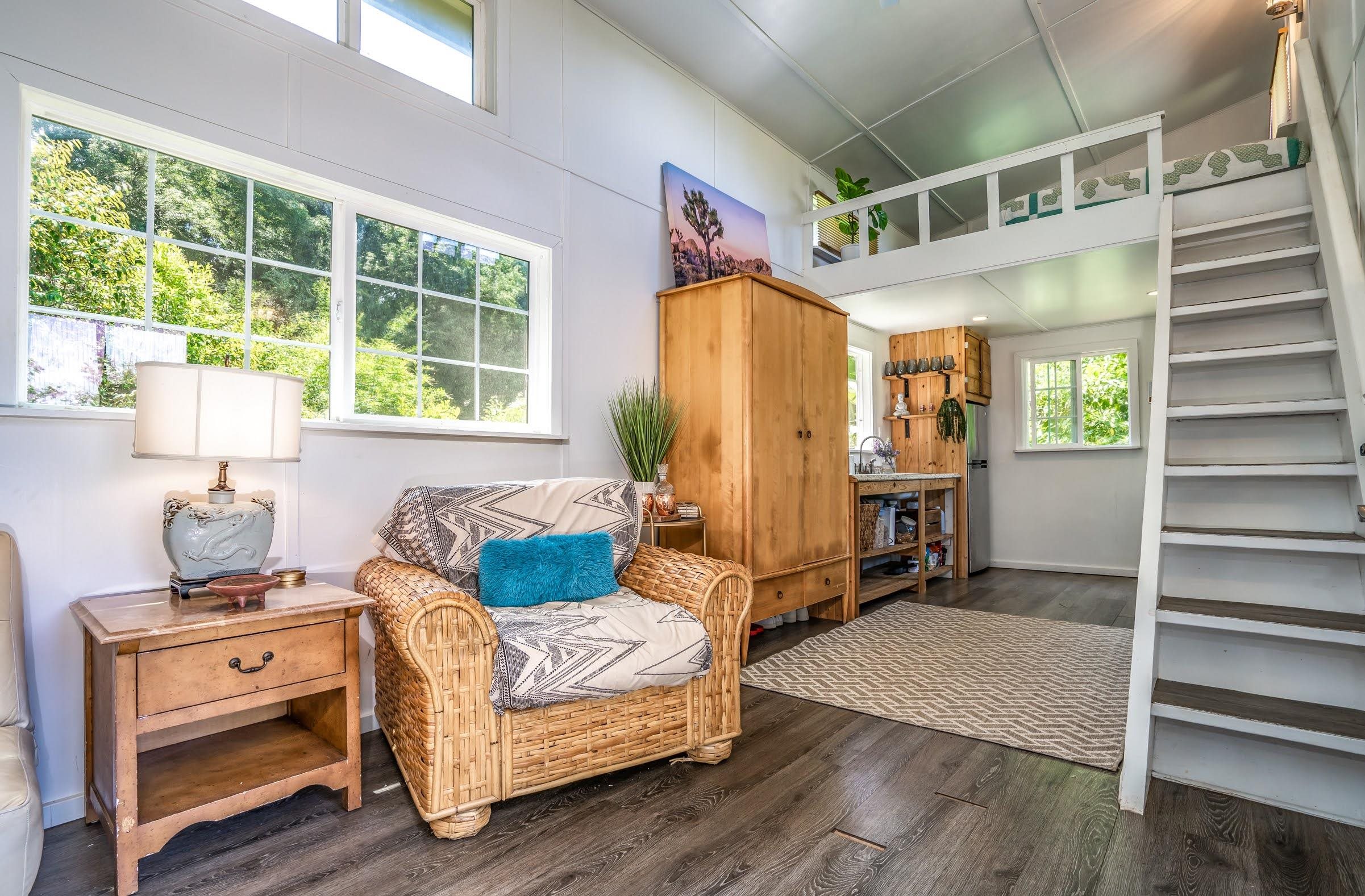 1740 Kokomo Road, Unit B Haiku, HI 96708 - Photo 21 of 29 a living room with furniture and a window