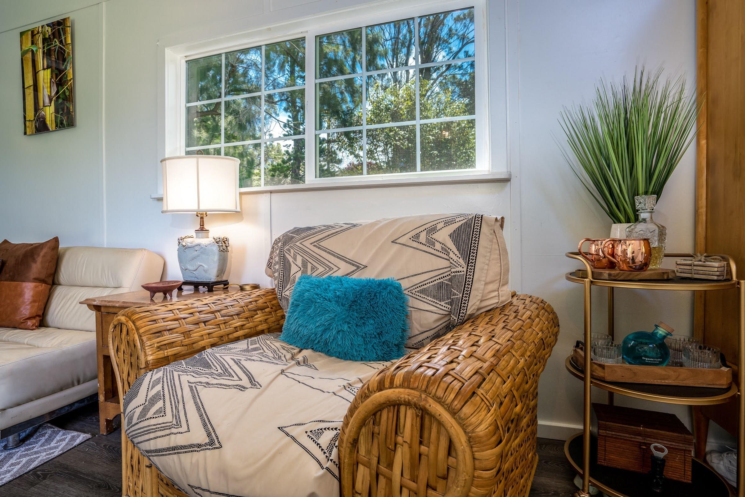 1740 Kokomo Road, Unit B Haiku, HI 96708 - Photo 22 of 29 a bedroom with two beds and a potted plant