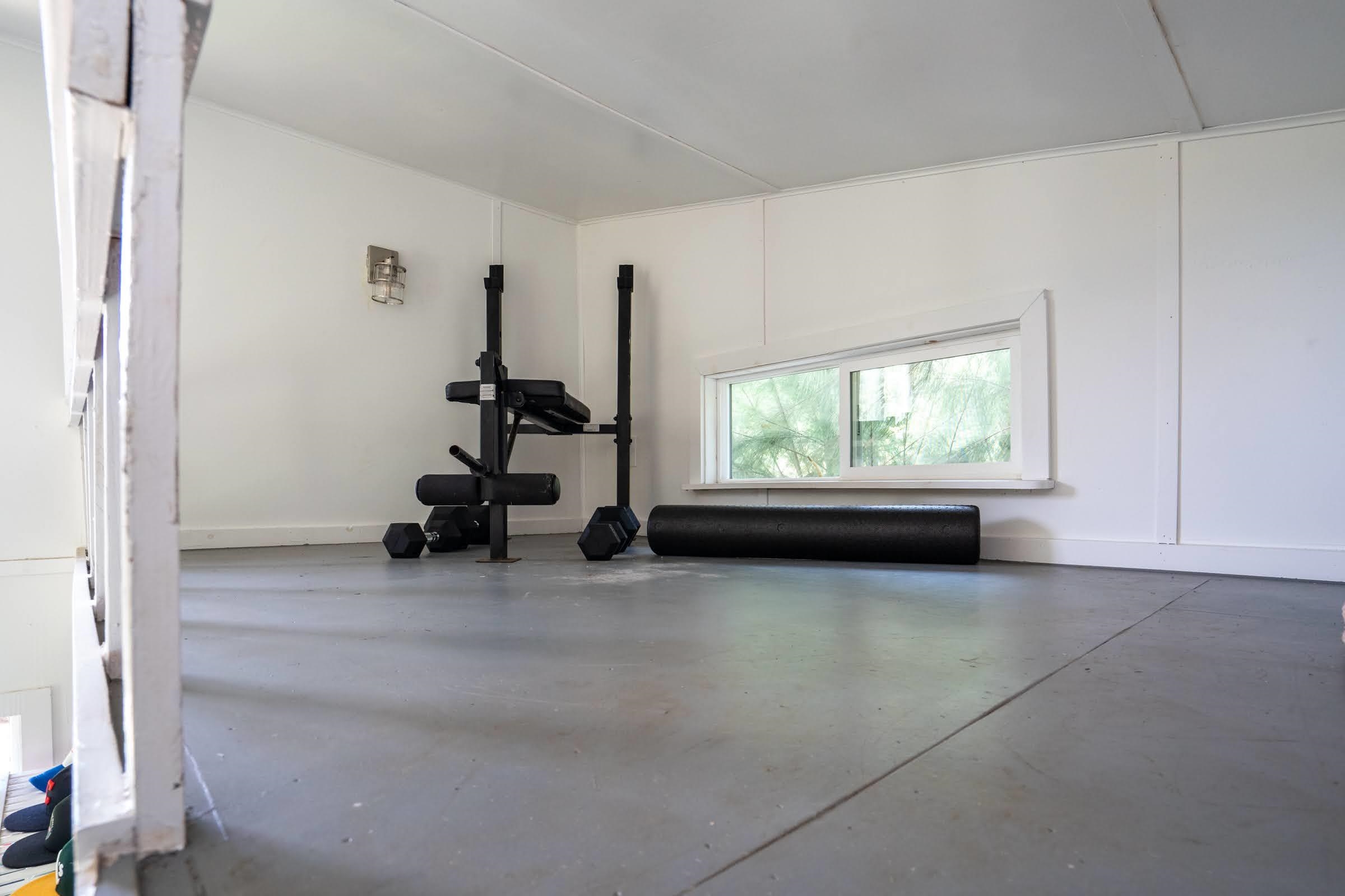 1740 Kokomo Road, Unit B Haiku, HI 96708 - Photo 27 of 29 a view of a livingroom with a car and a window