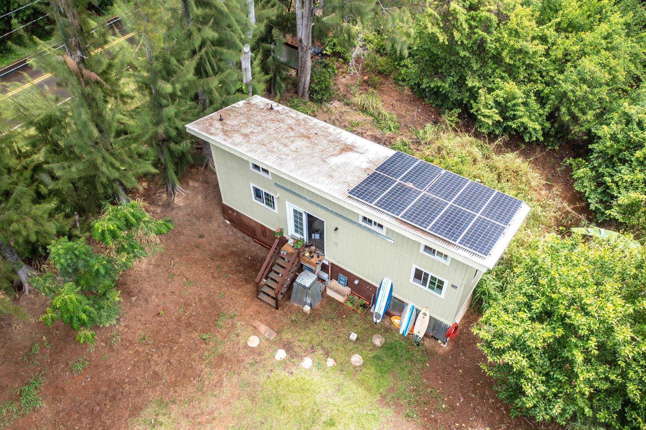 1740 Kokomo Road, Unit B Haiku, HI 96708 - Photo 10 of 29 an aerial view of a house with a yard