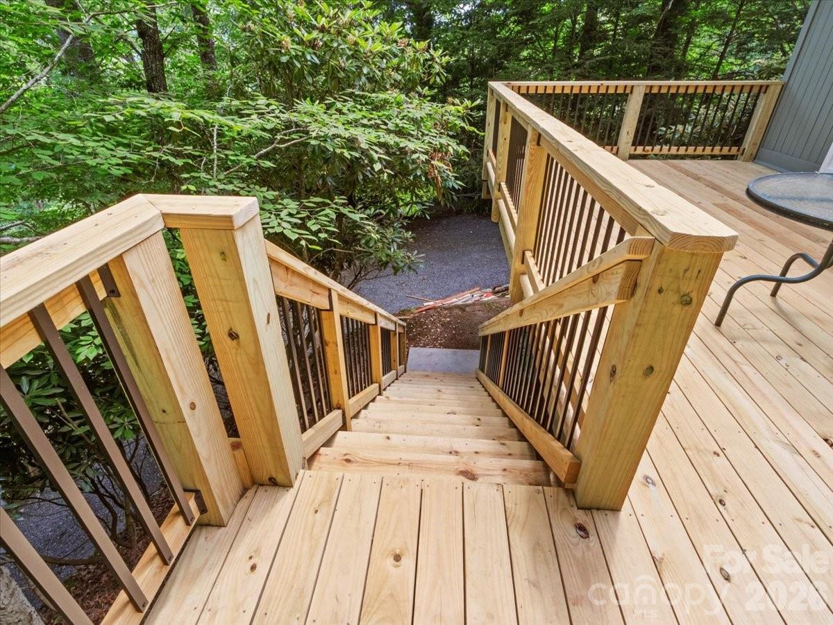 119 Foxden Road Mars Hill, NC 28754 - Photo 7 of 38 a view of deck with wooden floor and fence