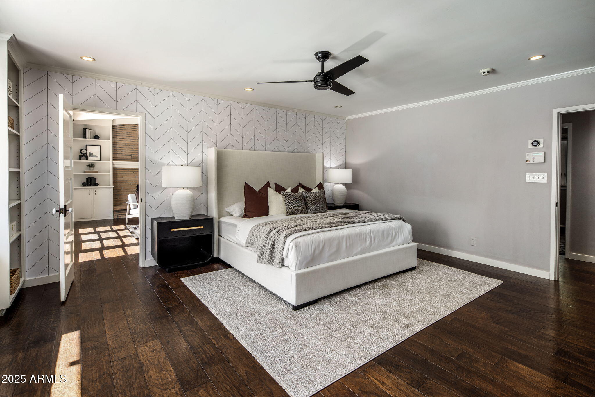 525 West Berridge Lane Phoenix, AZ 85013 - Photo 18 of 67 a bedroom with a bed and wooden floor