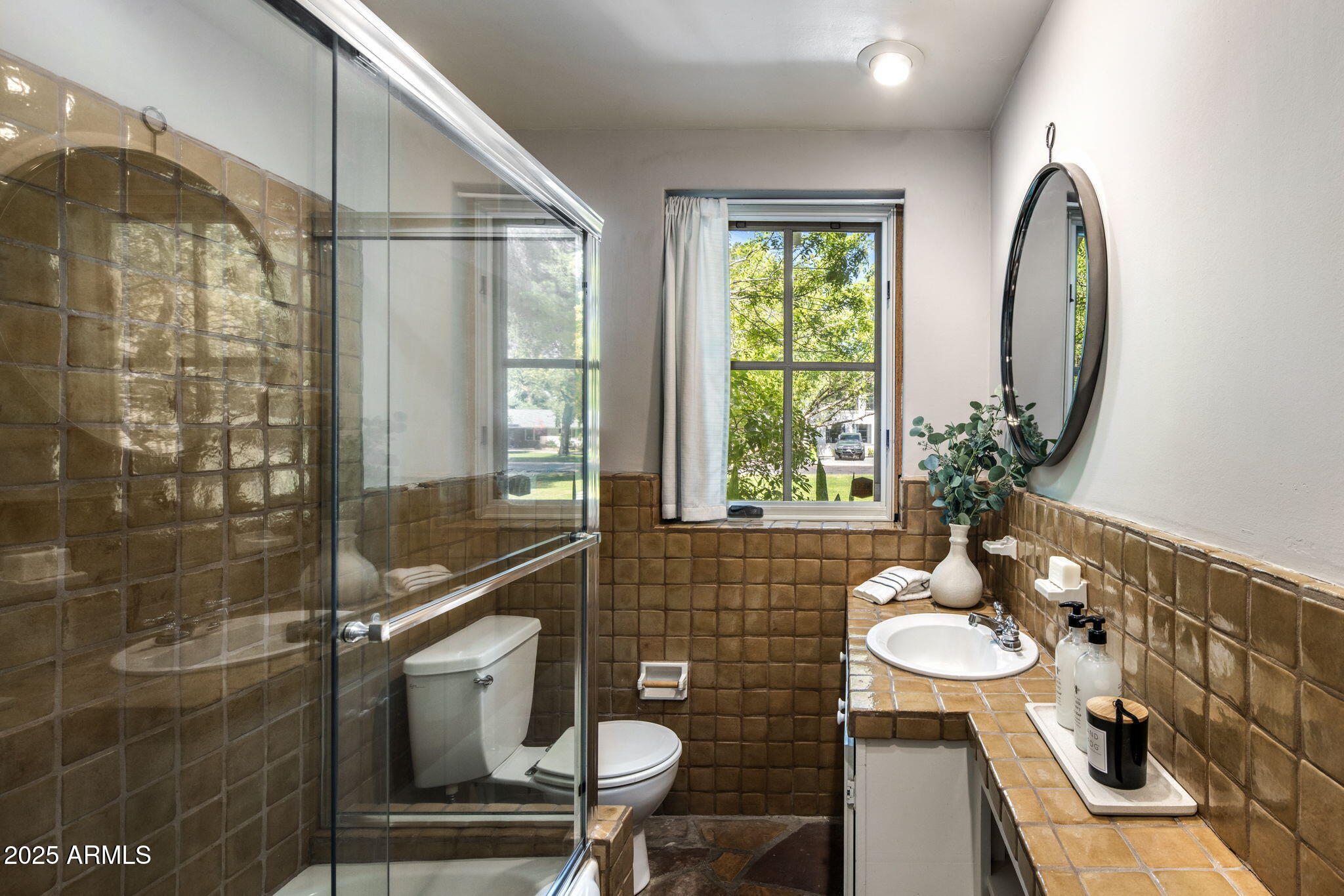 525 West Berridge Lane Phoenix, AZ 85013 - Photo 27 of 67 a bathroom with a sink and a mirror