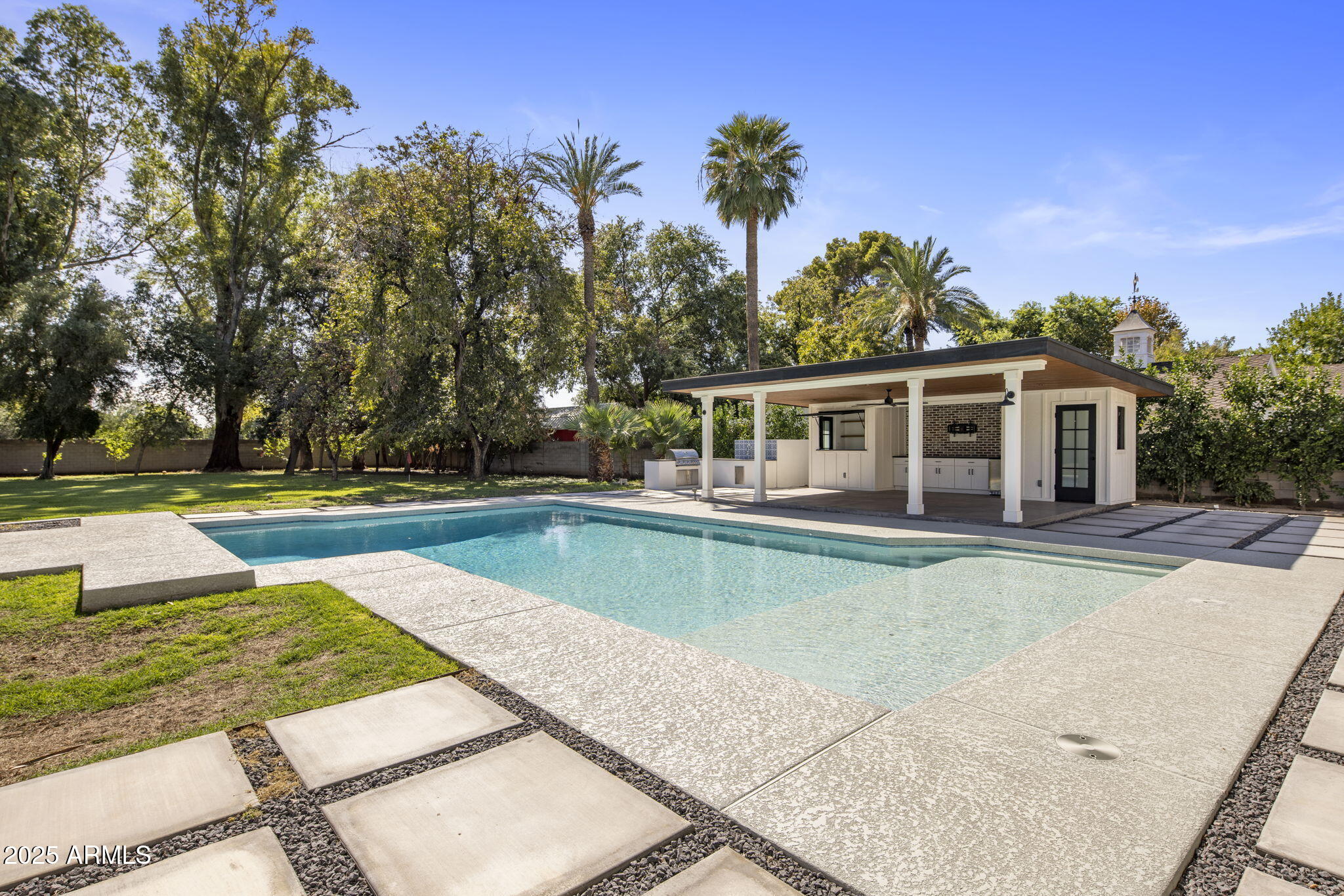 525 West Berridge Lane Phoenix, AZ 85013 - Photo 48 of 67 a view of a house with swimming pool