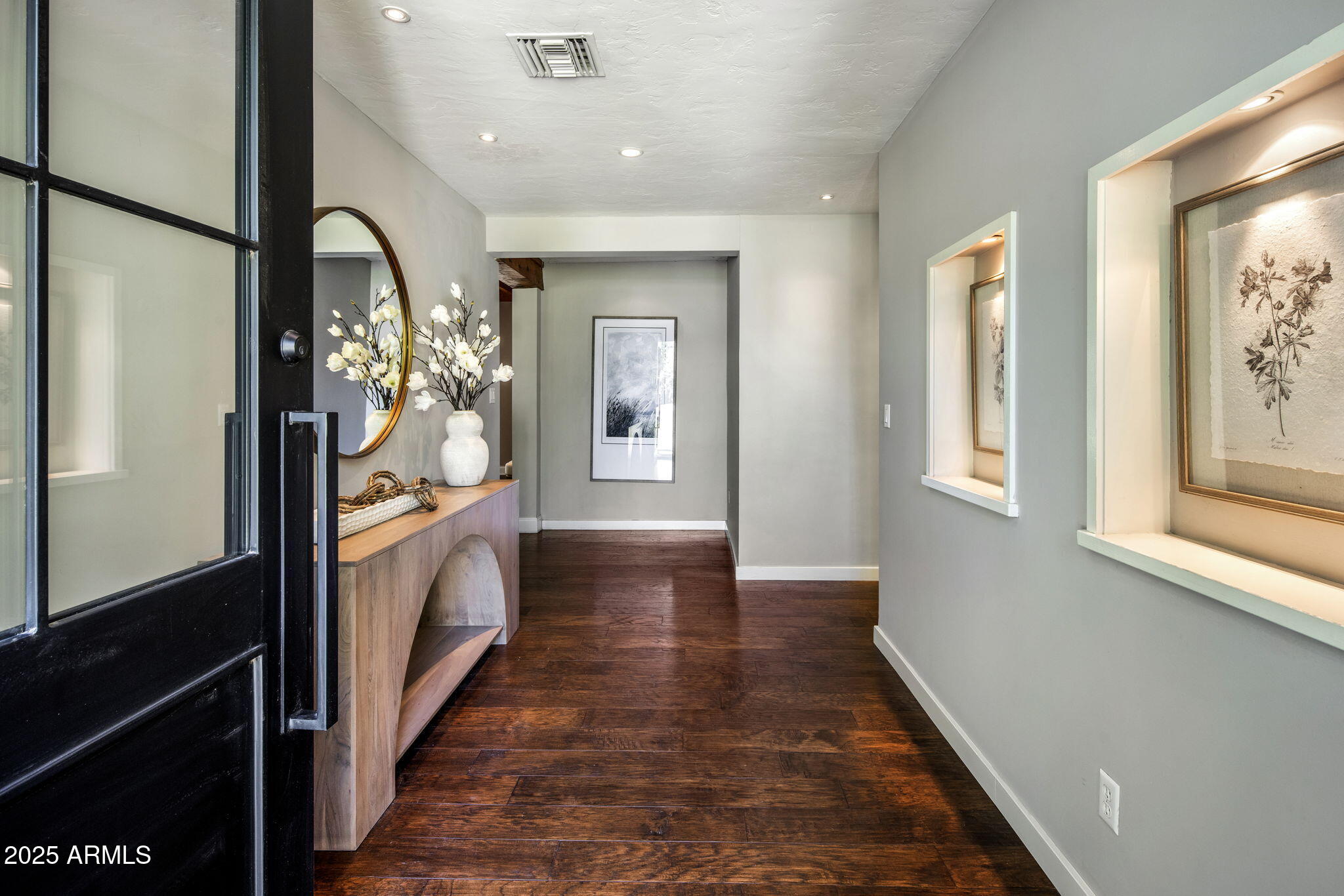 525 West Berridge Lane Phoenix, AZ 85013 - Photo 6 of 67 a view of a hallway to a livingroom with furniture