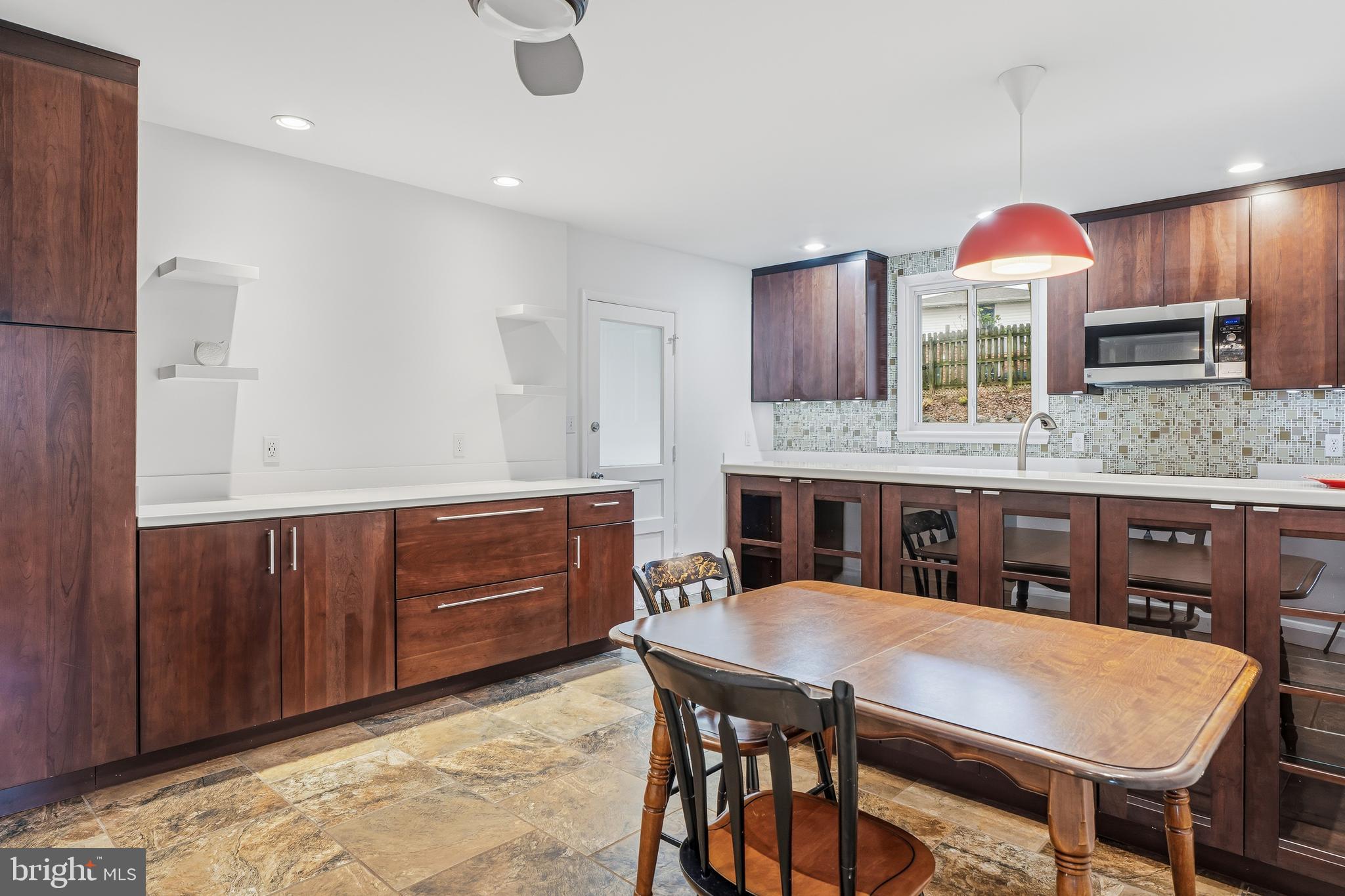 60 Belmore Road Lutherville-Timonium, MD 21093 - Photo 9 of 28 a kitchen with a table and chairs in it