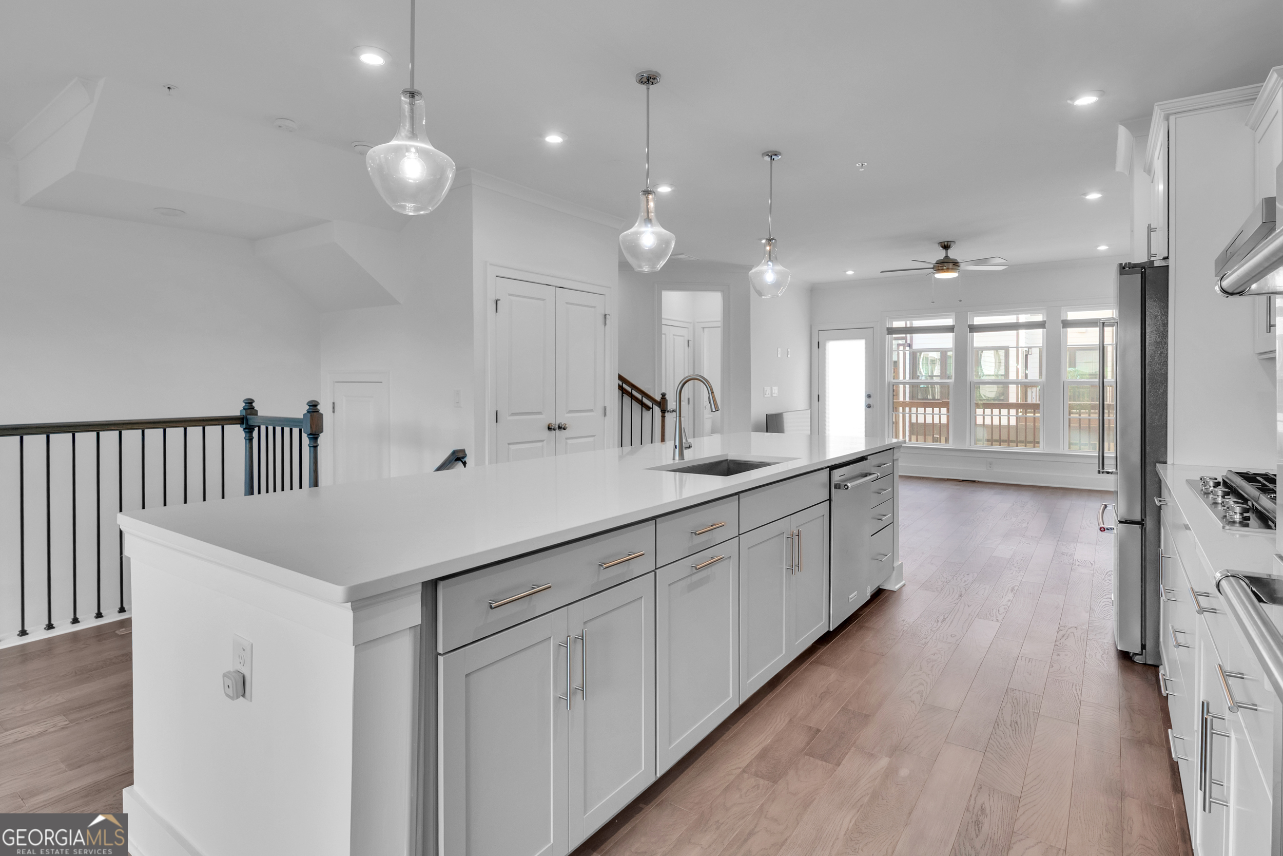 545 Whitlox Road Northwest Atlanta, GA 30309 - Photo 11 of 65 a large white kitchen with a sink and dish washer