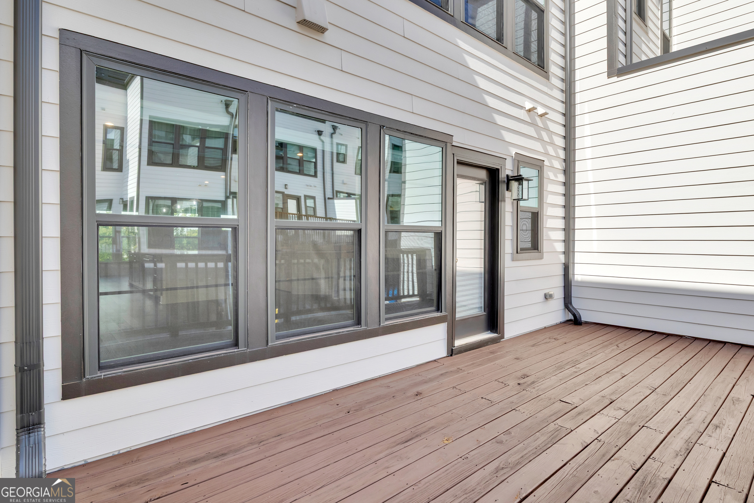 545 Whitlox Road Northwest Atlanta, GA 30309 - Photo 42 of 65 a view of outdoor space with wooden floor and windows
