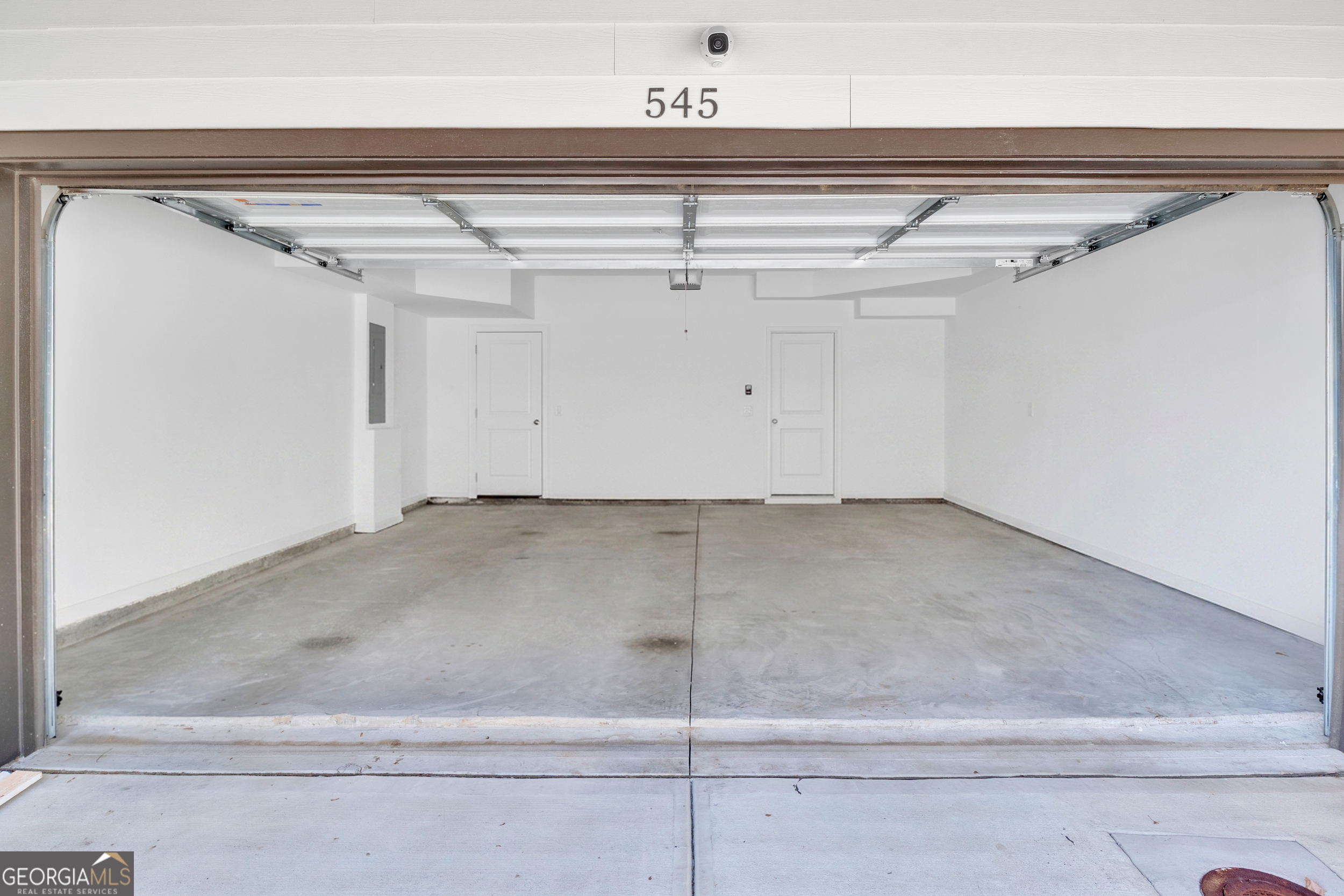 545 Whitlox Road Northwest Atlanta, GA 30309 - Photo 52 of 65 a view of a room with racks on the wall