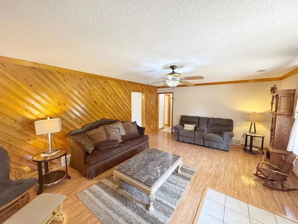 a living room with furniture and a couch
