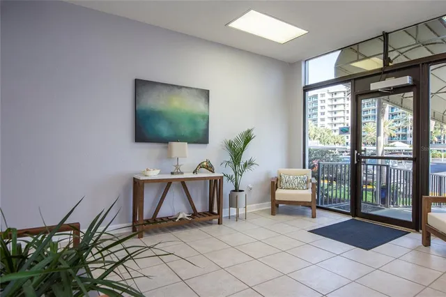 a view of a swimming pool and lounge chairs