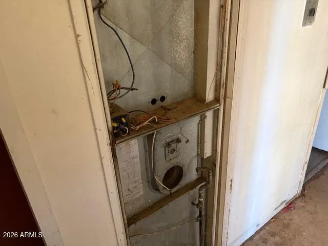 a bathroom with a granite countertop sink a toilet and path