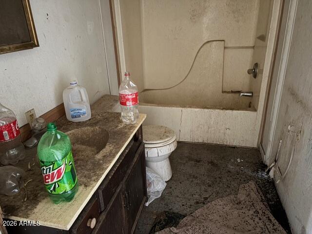 470 North Warren Road Benson, AZ 85602 - Photo 18 of 20 a bathroom with a granite countertop sink a toilet and path
