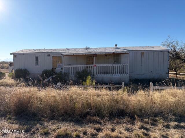470 North Warren Road Benson, AZ 85602 - Photo 9 of 20 a view of a house with a yard