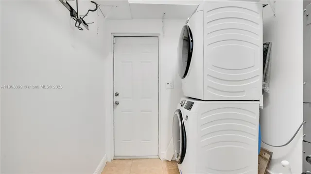 a bathroom with a shower and a mirror