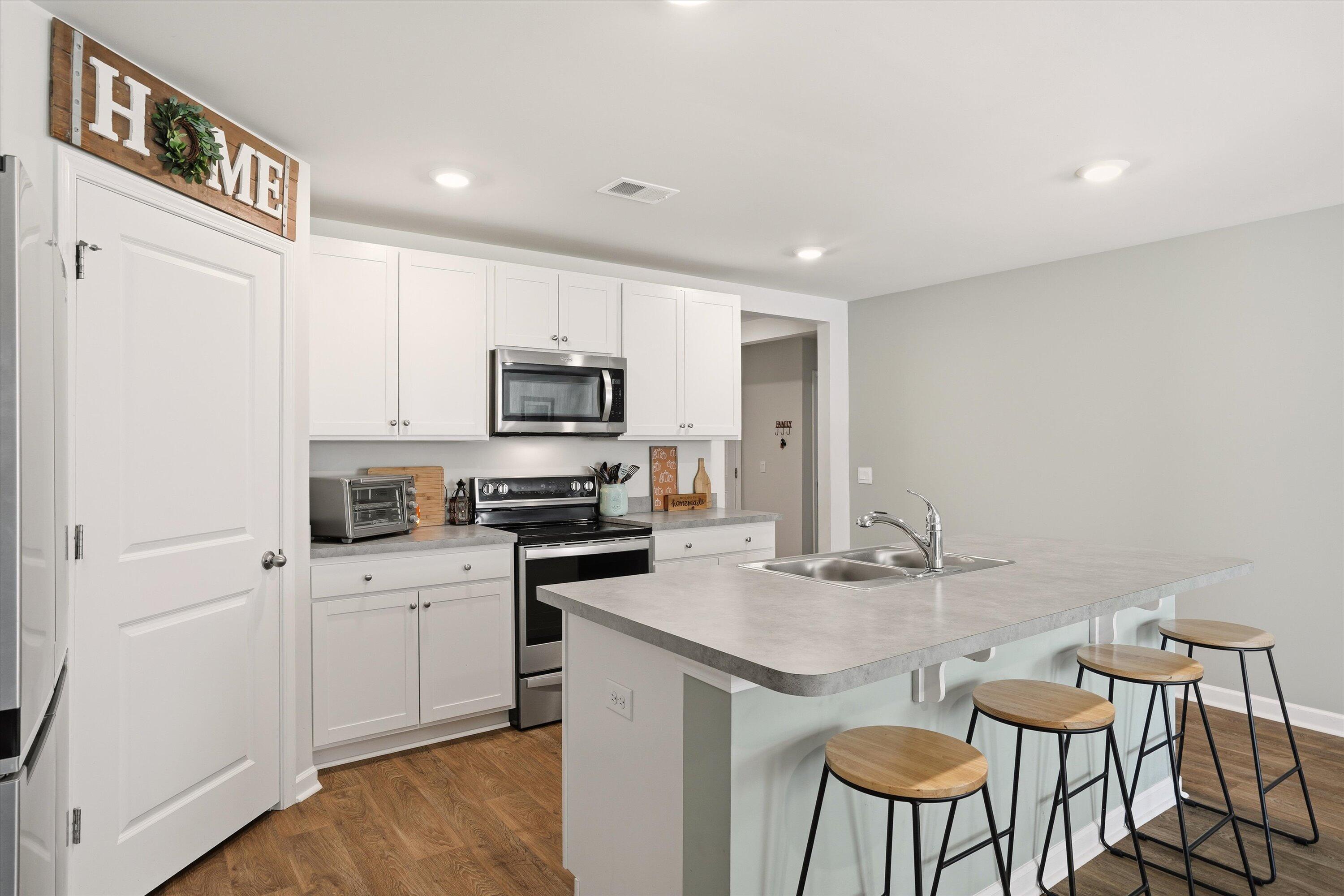 361 Spruce Ivy Street Moncks Corner, SC 29461 - Photo 20 of 44 White Cabinets