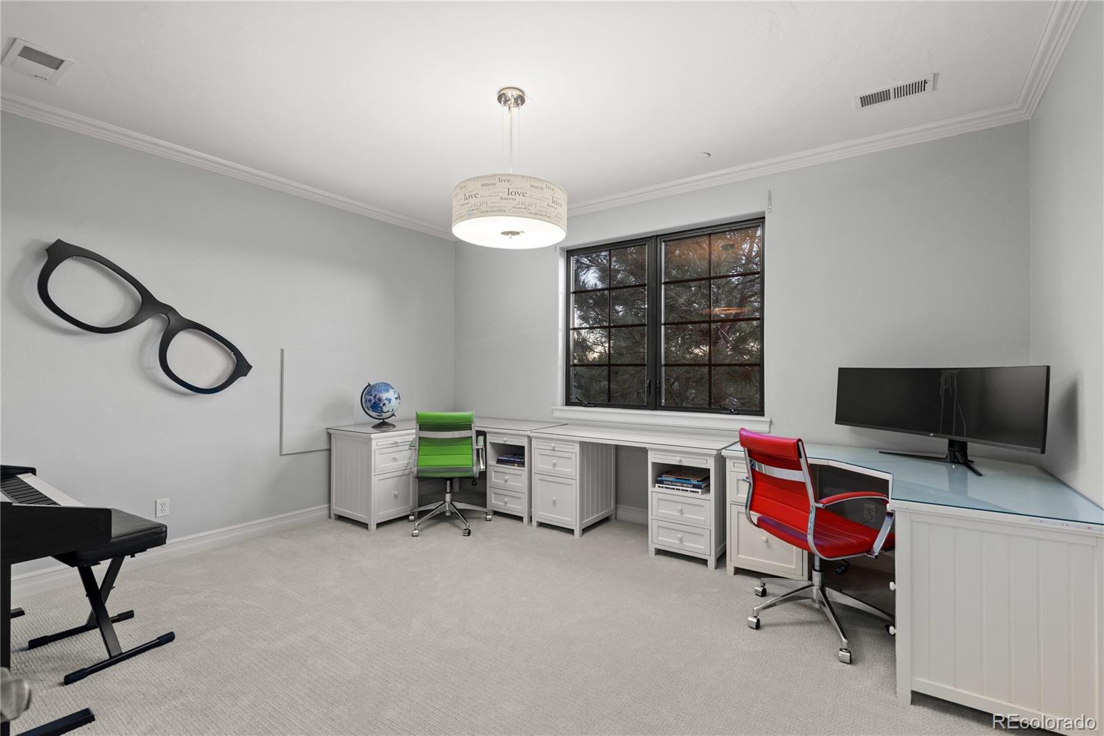 1033 Buffalo Ridge Road Castle Pines, CO 80108 - Photo 27 of 43 a view of a workspace with furniture
