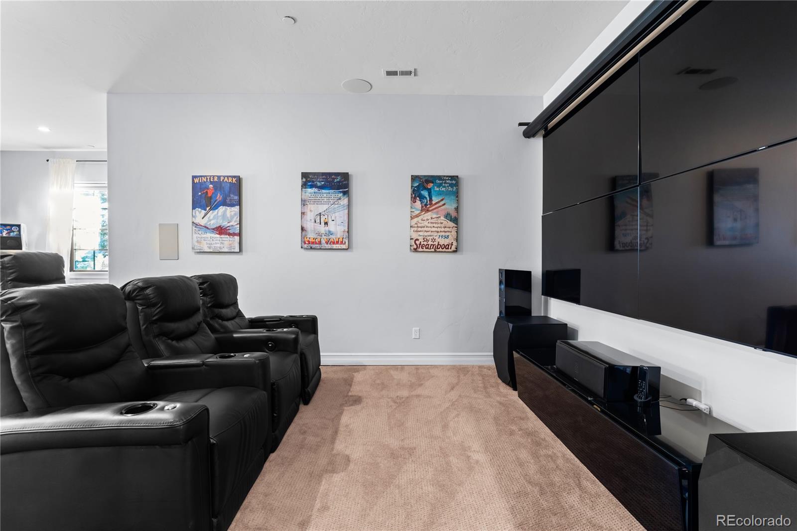 1033 Buffalo Ridge Road Castle Pines, CO 80108 - Photo 31 of 43 a living room with furniture and a couch