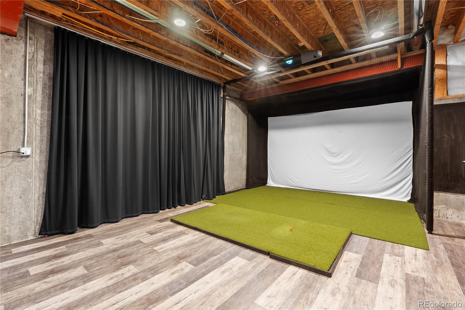 1033 Buffalo Ridge Road Castle Pines, CO 80108 - Photo 34 of 43 a view of empty room with wooden floor