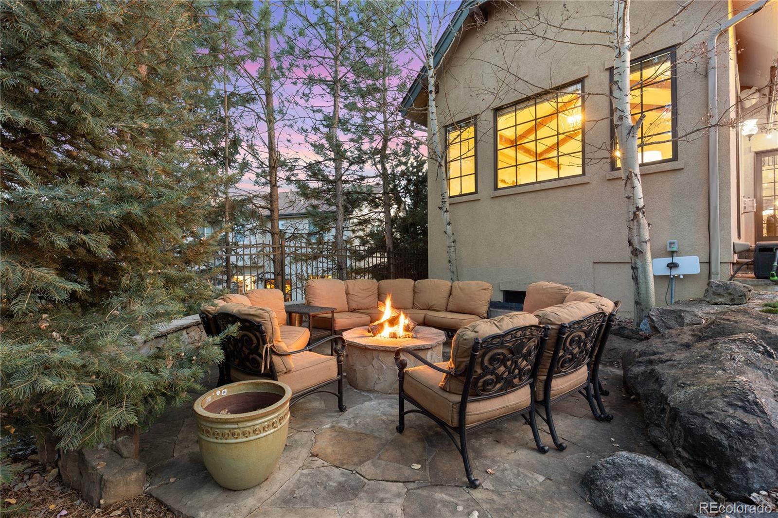 1033 Buffalo Ridge Road Castle Pines, CO 80108 - Photo 38 of 43 a outdoor space with furniture