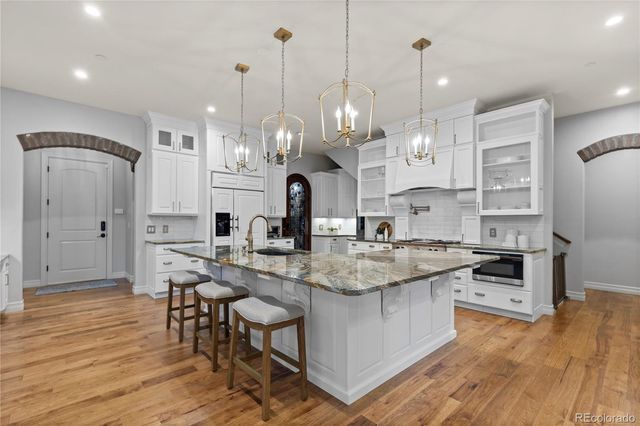 $2,495,000 | 1033 Buffalo Ridge Road, Castle Pines, CO 80108