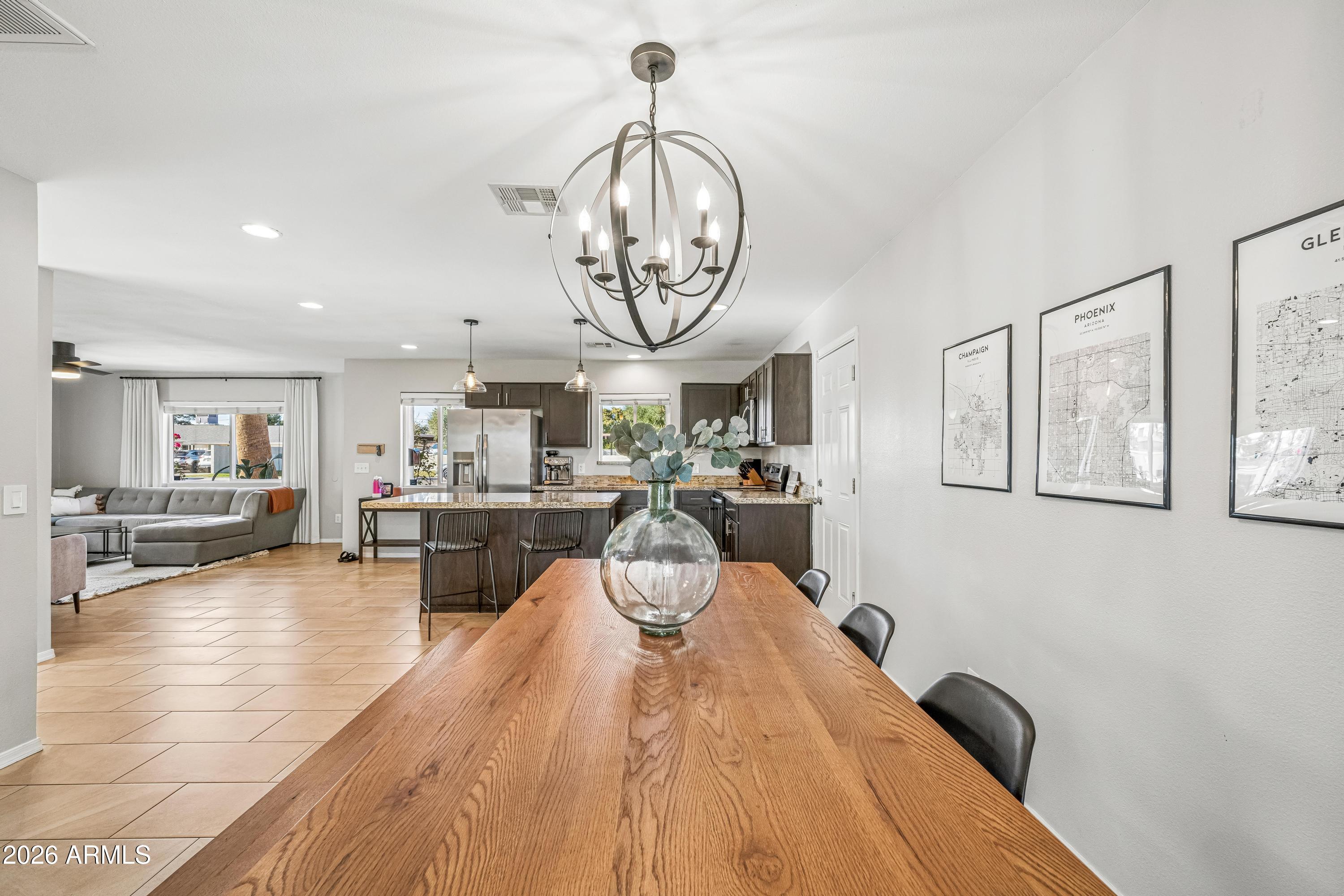 2327 East Weldon Avenue Phoenix, AZ 85016 - Photo 10 of 34 a view of a kitchen with table and chairs