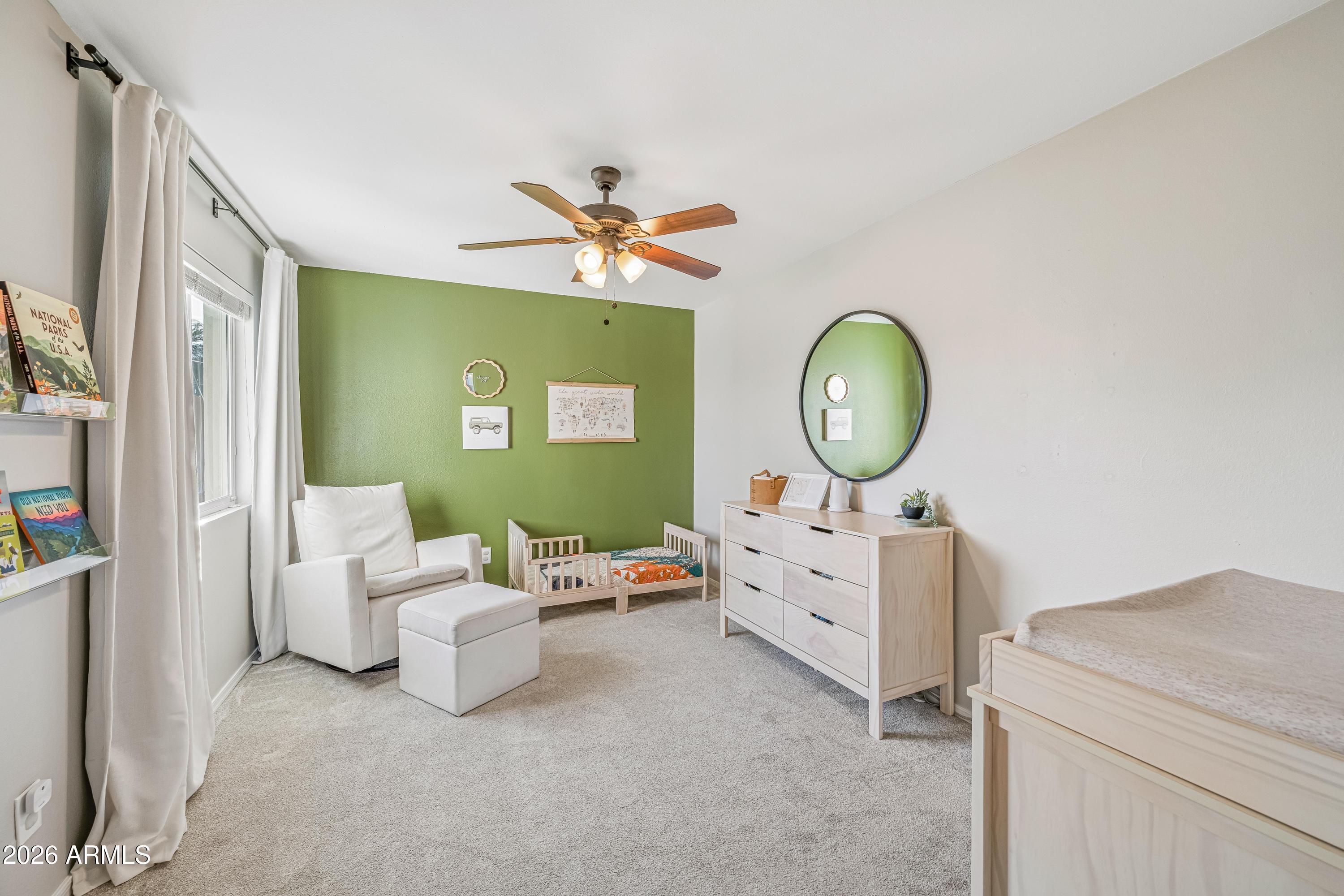 2327 East Weldon Avenue Phoenix, AZ 85016 - Photo 23 of 34 a living room with furniture and a mirror