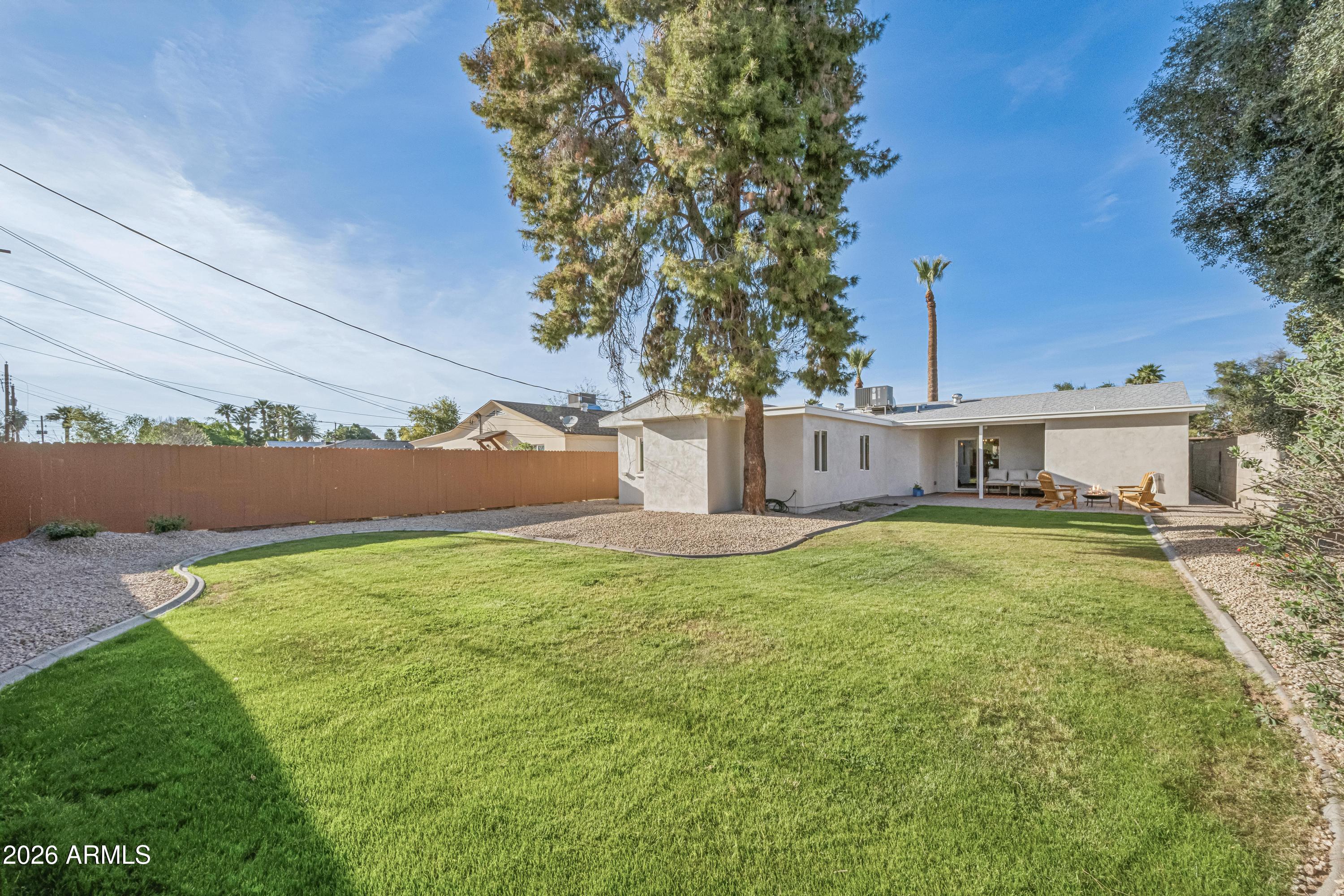 2327 East Weldon Avenue Phoenix, AZ 85016 - Photo 27 of 34 a view of a house with backyard and a tree
