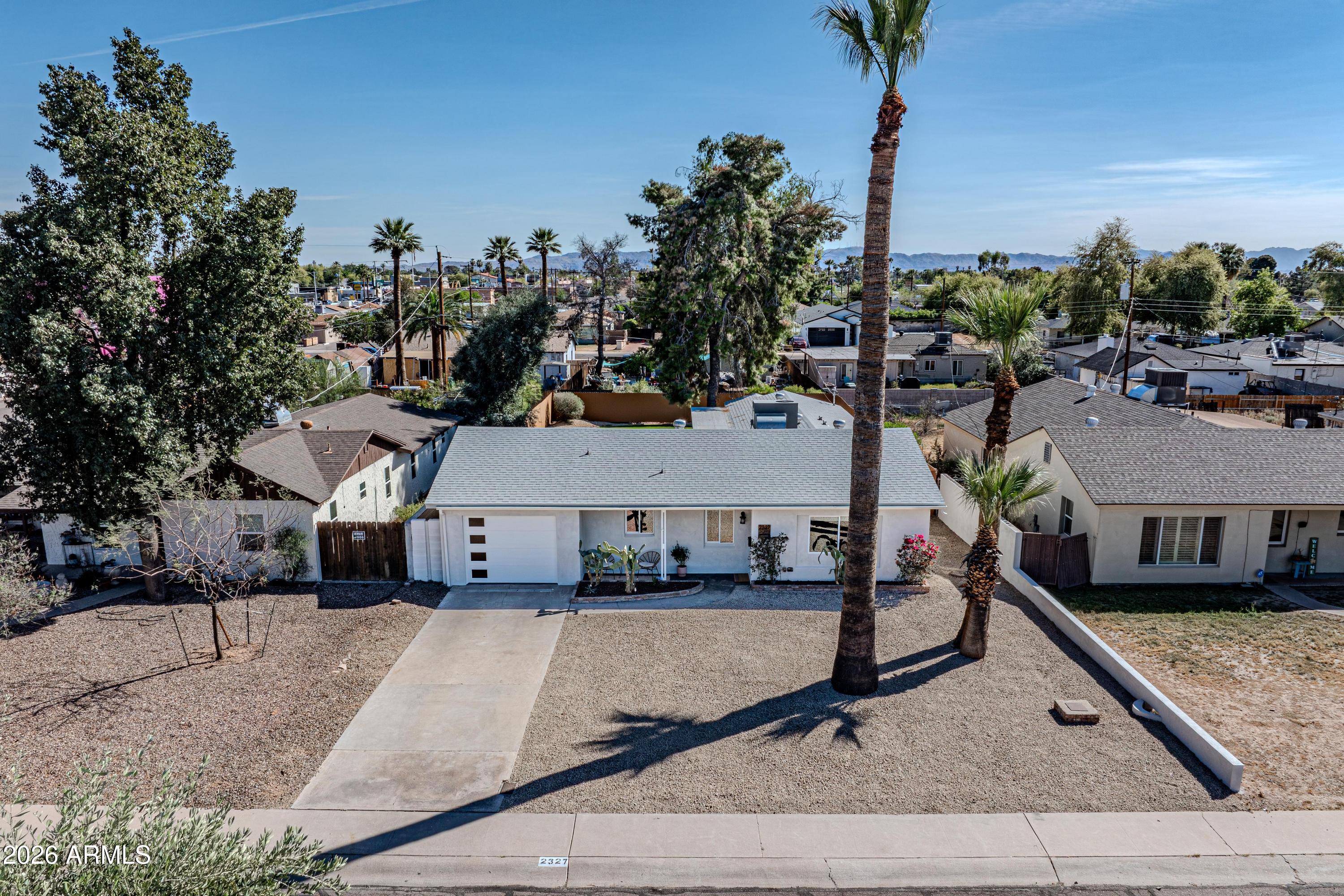 2327 East Weldon Avenue Phoenix, AZ 85016 - Photo 2 of 34 a view of a house with a park