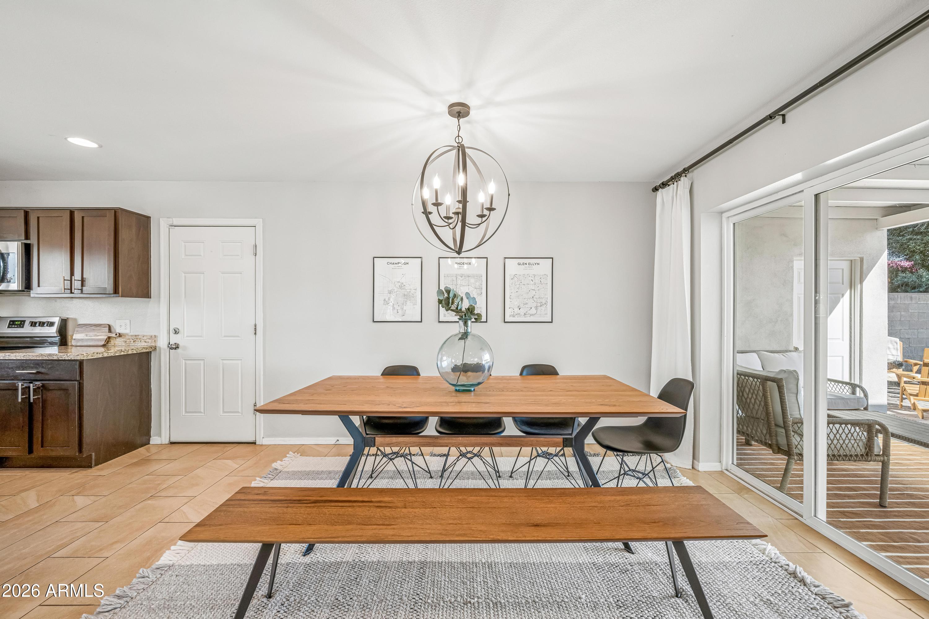 2327 East Weldon Avenue Phoenix, AZ 85016 - Photo 7 of 34 a view of a dining room with furniture