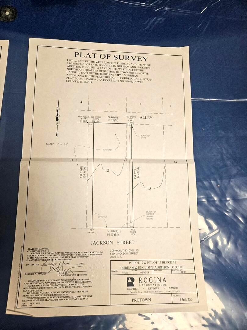 557 East Jackson Street Joliet, IL 60432 - Photo 6 of 8 view of a black and white photo