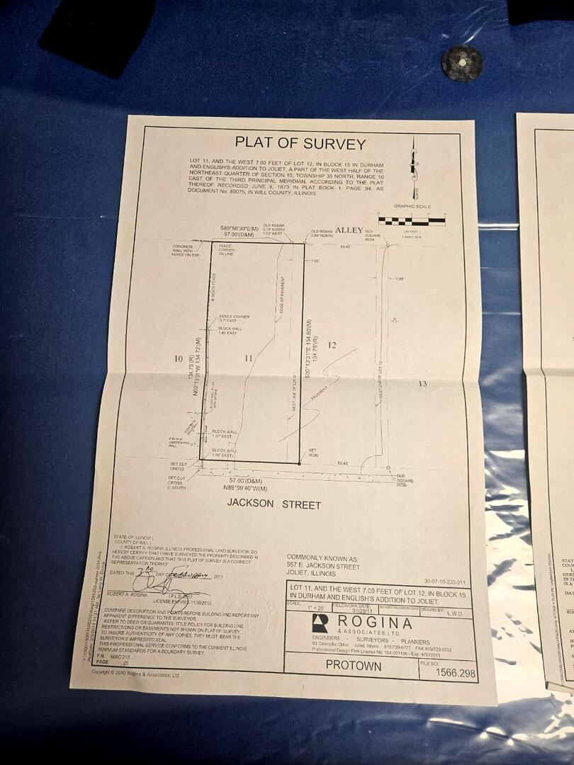 557 East Jackson Street Joliet, IL 60432 - Photo 7 of 8 view of a refrigerator with wooden floor