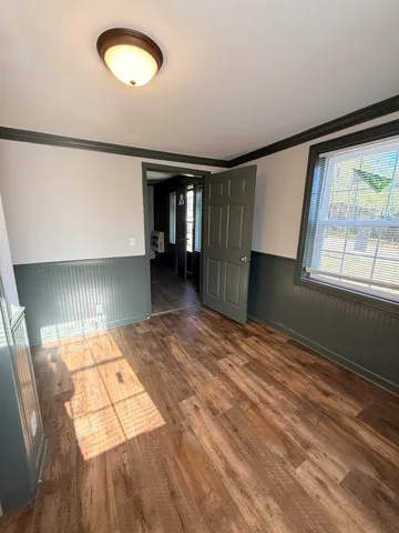 a view of an empty room and window