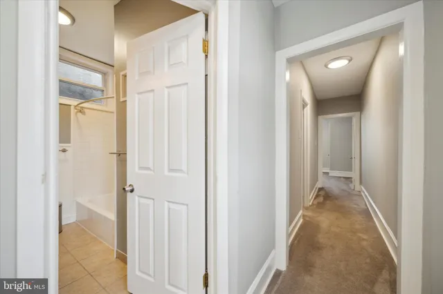 a room with a bed and a window