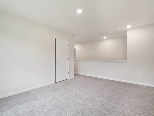 an empty room with an entryway