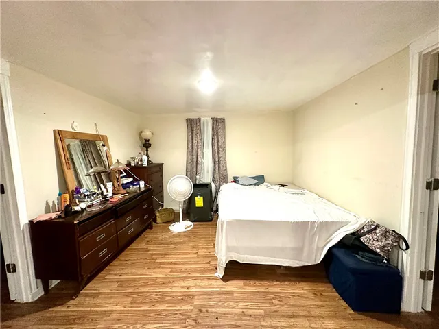 a bed room with a bed and a couch