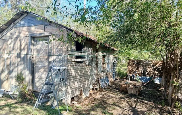 a backyard of a house with lots of green space