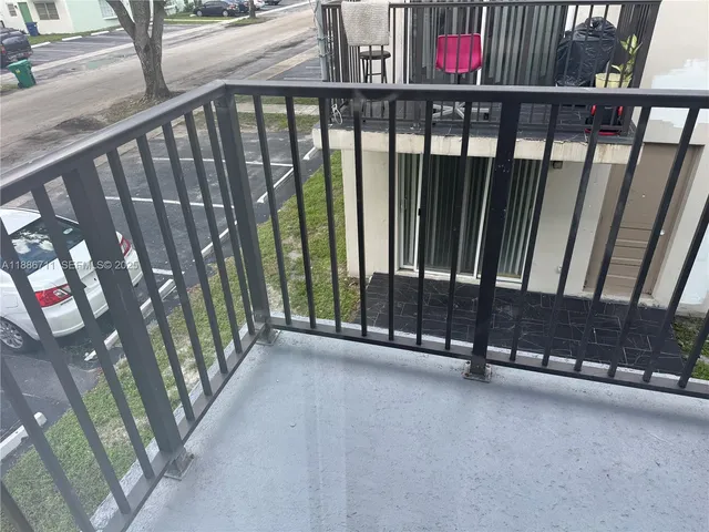 a view of a bathroom from a hallway